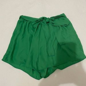 Green flowy shorts